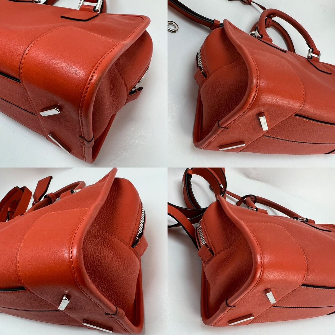 Red leather handbag shown from multiple angles on a white background