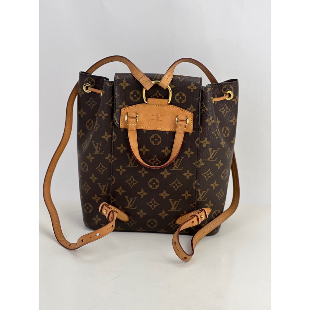 LOUIS VUITTON Montsouris NM Monogram Backpack front view showing luxury bags design and leather details.