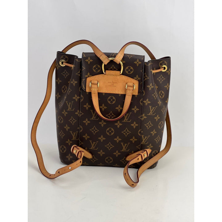 LOUIS VUITTON Montsouris NM Monogram Backpack front view showing luxury bags design and leather details.