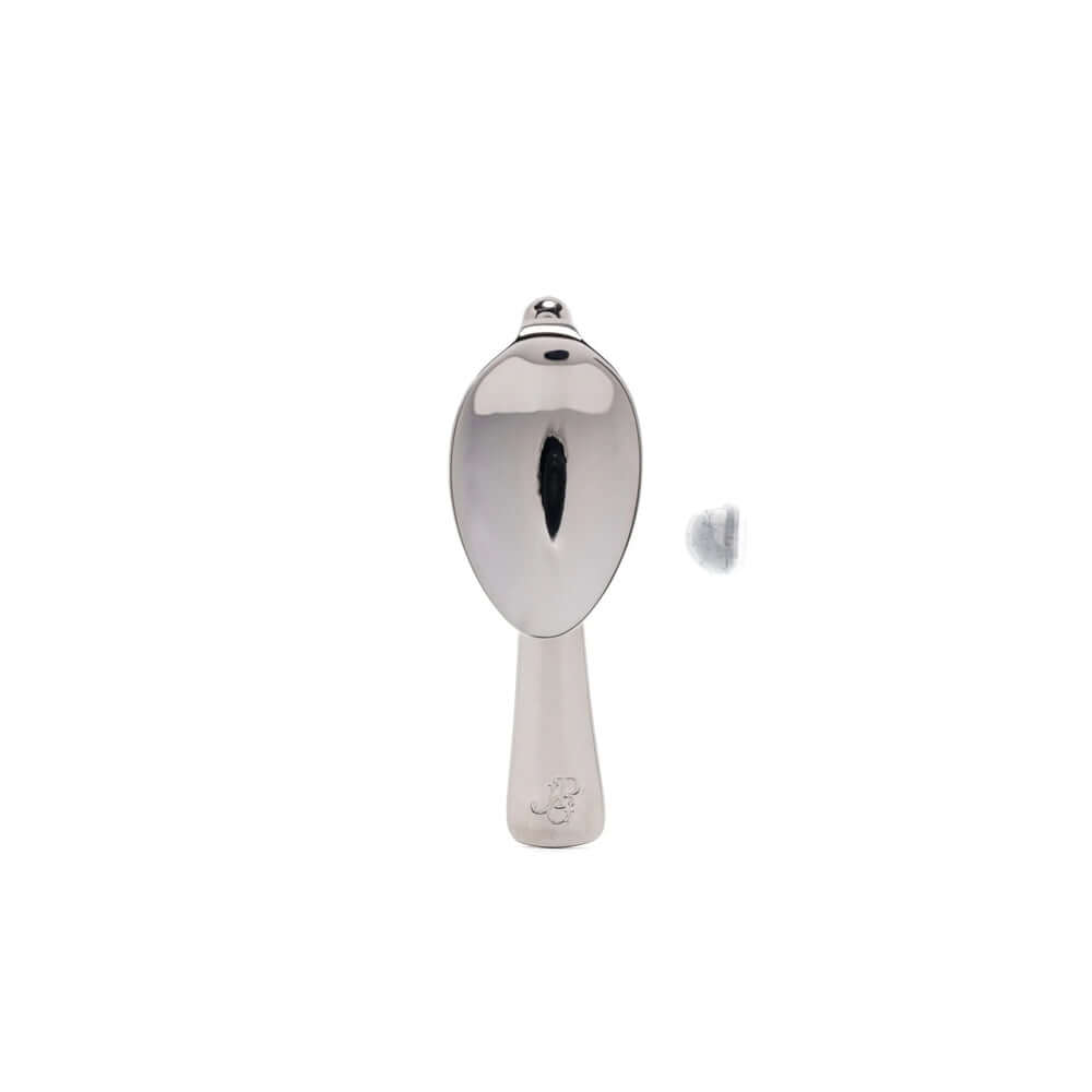 Silver spoon on a white background