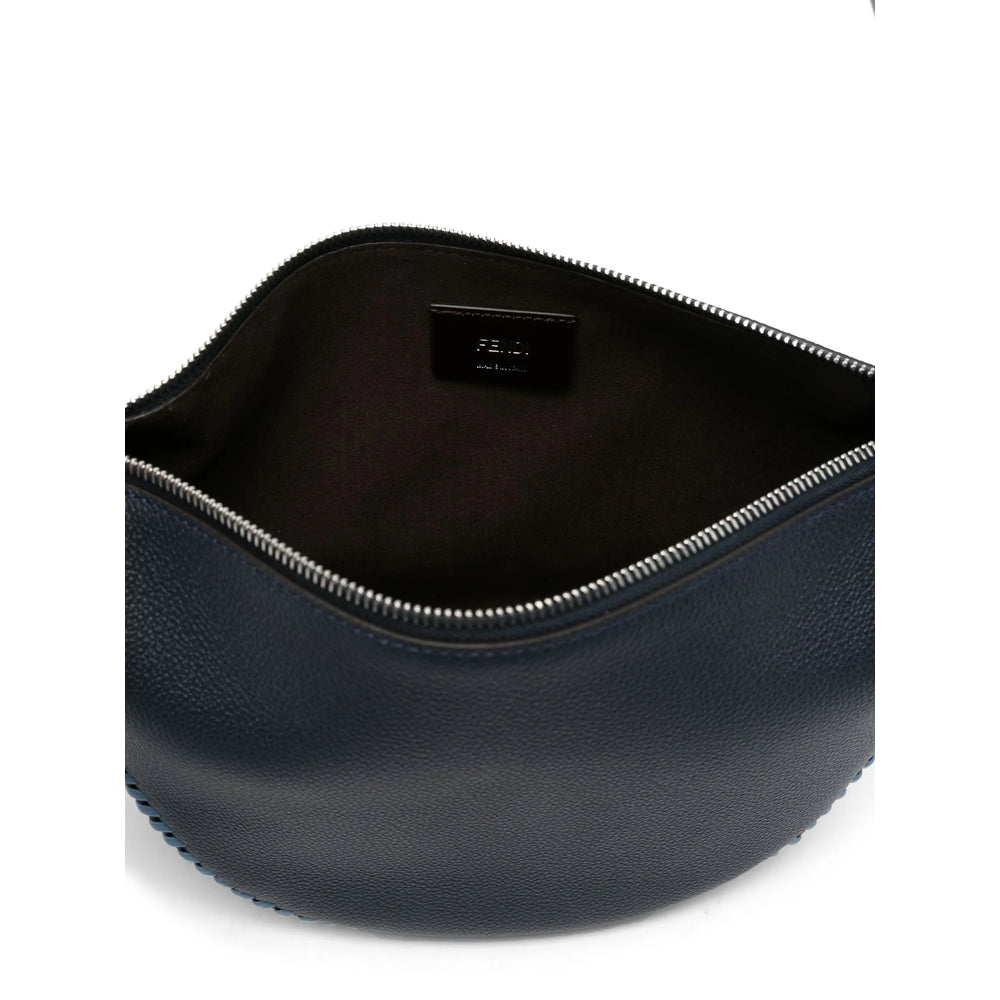 Black leather pouch with silver zipper on a white background