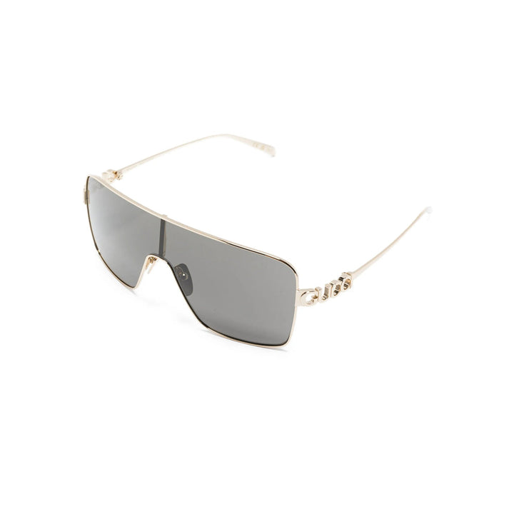Gold-framed sunglasses with reflective lenses on a white background