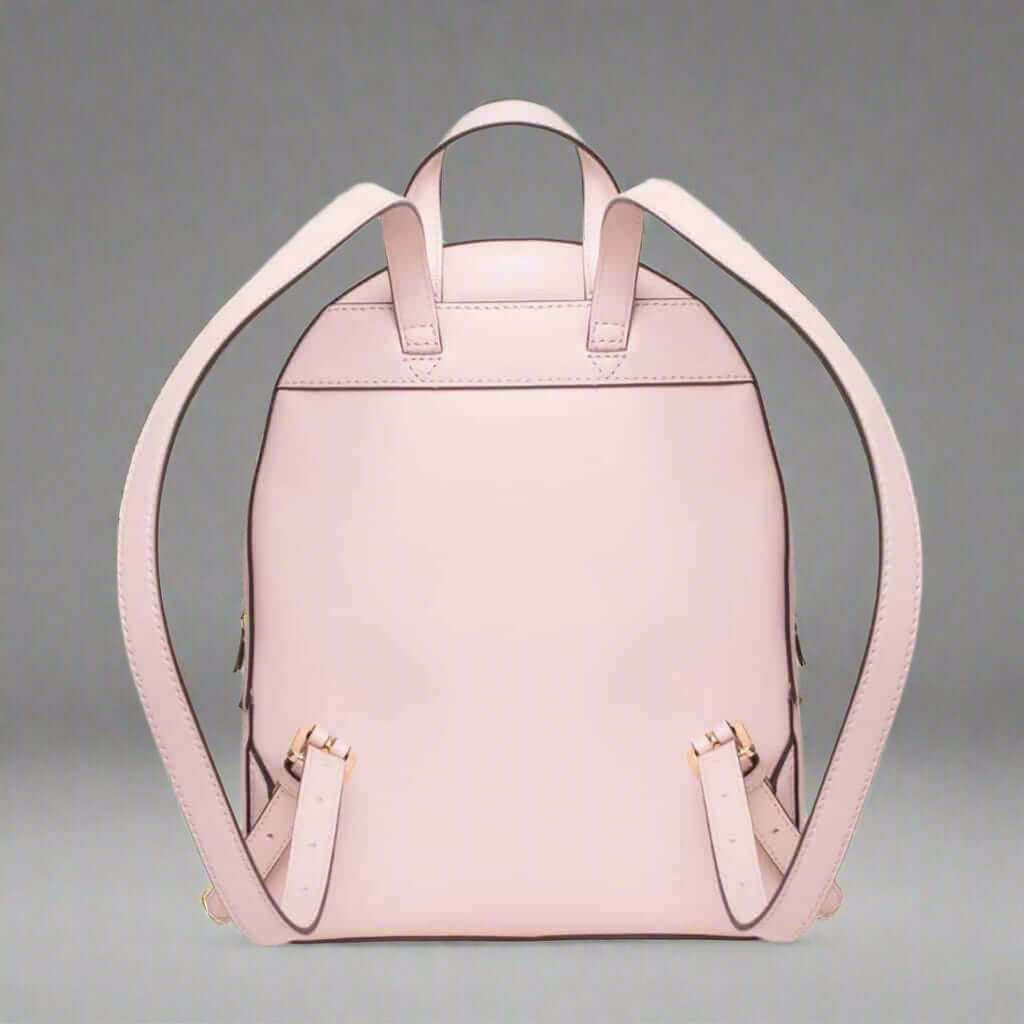 Pink backpack on a white background