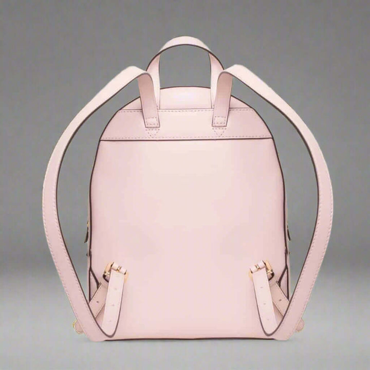 Pink backpack on a white background