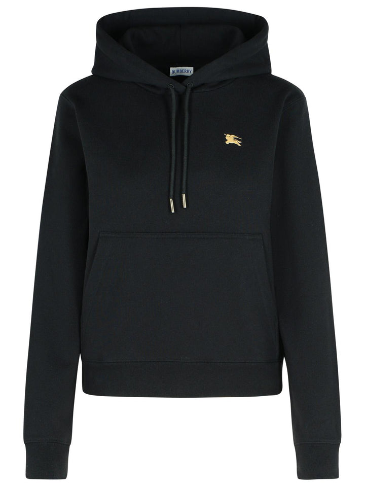 Black hoodie with a gold logo on a white background