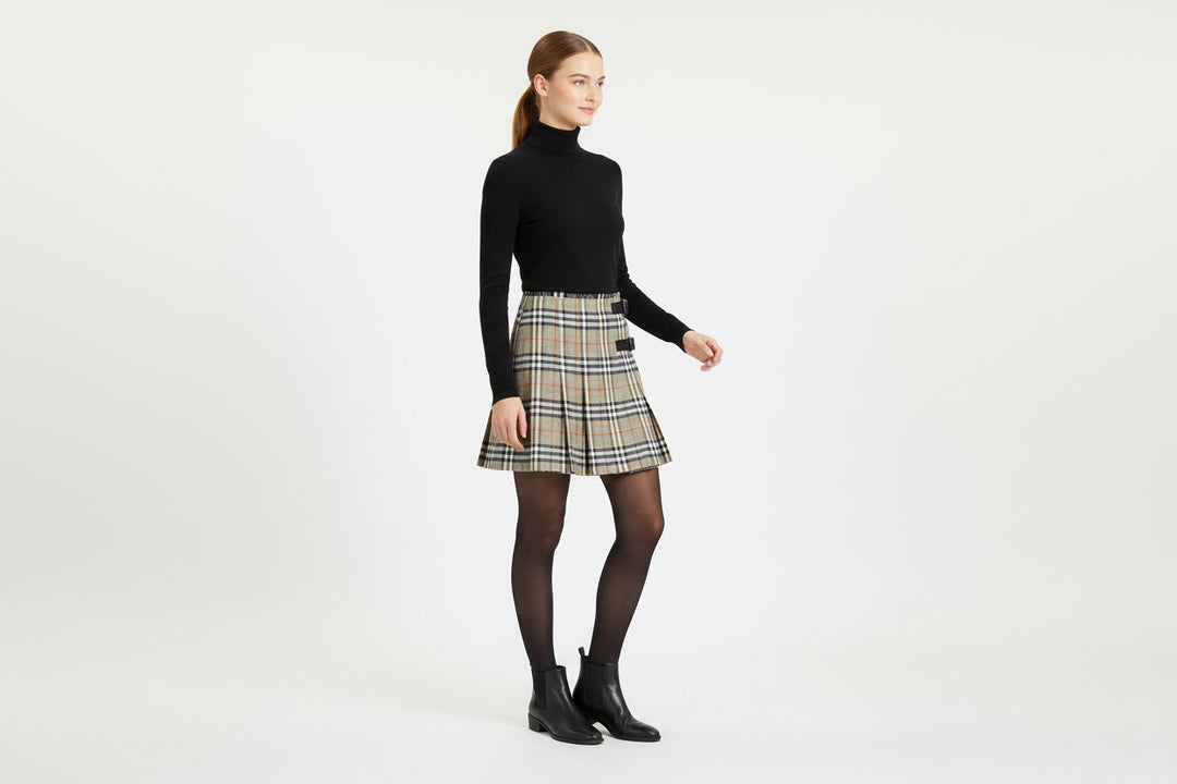 Plaid skirt with a black belt on a white background