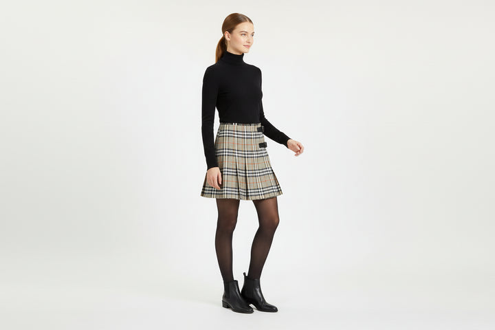 Plaid skirt with a black belt on a white background