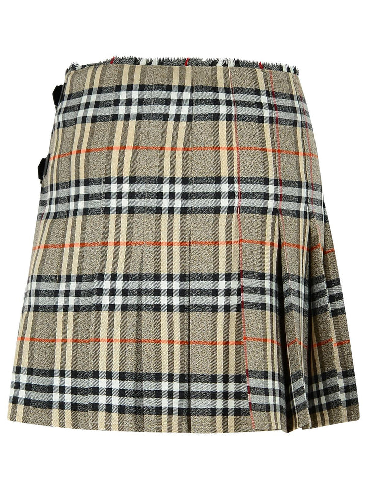Plaid skirt with a pattern of beige, black, and red on a white background