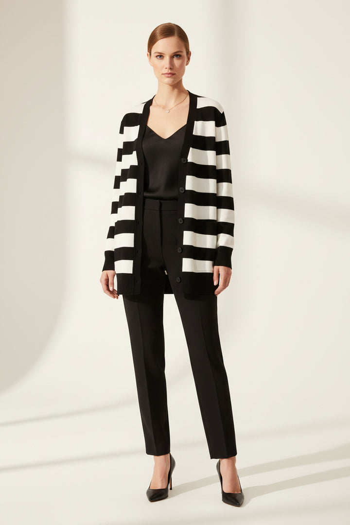 Black and white striped cardigan on a white background