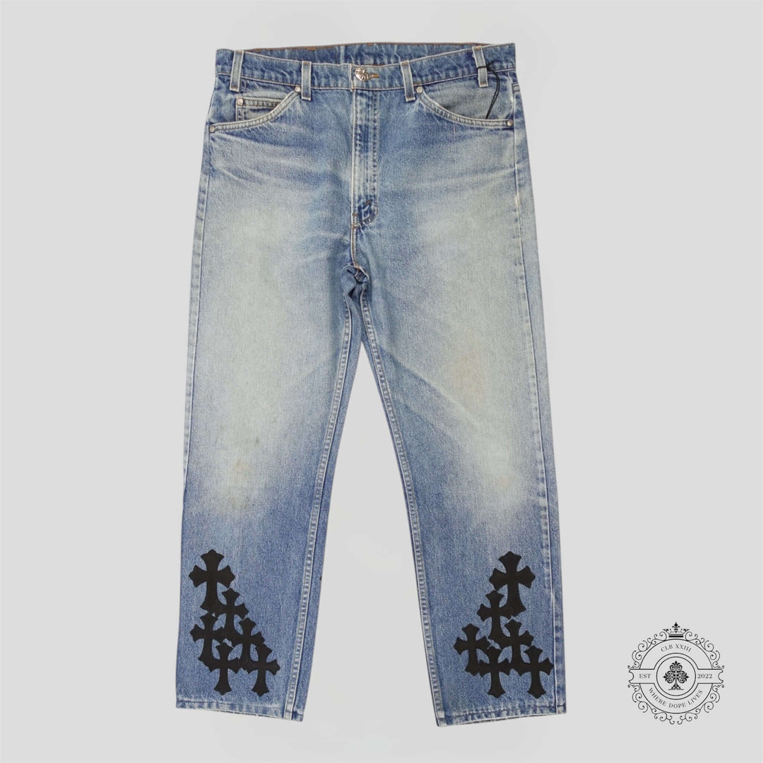 Chrome Hearts Cross Patch Jeans with unique cross patch design, perfect for luxury fashion enthusiasts.