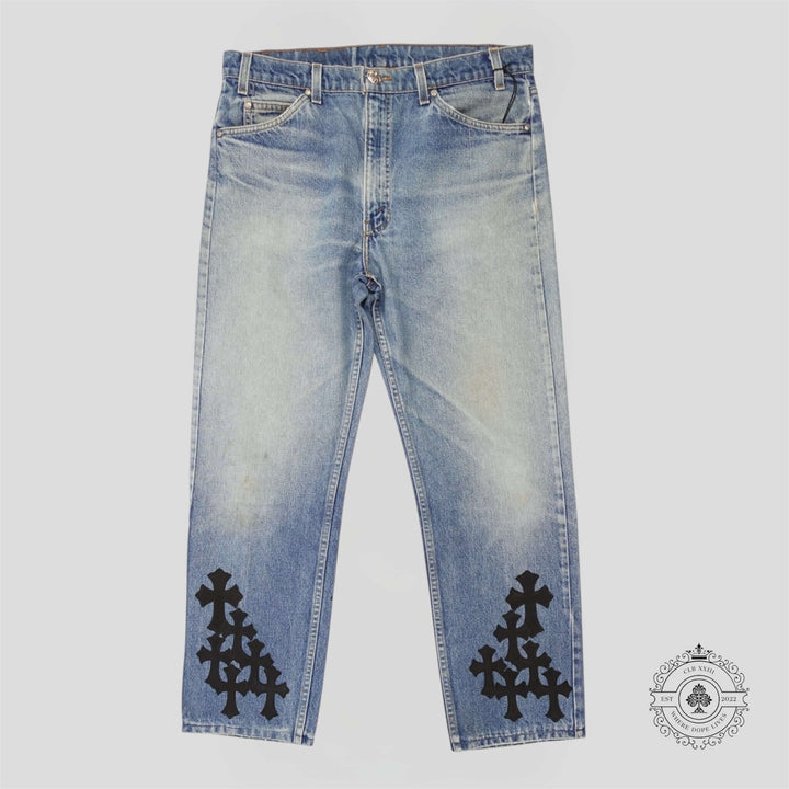 Chrome Hearts Cross Patch Jeans with unique cross patch design, perfect for luxury fashion enthusiasts.