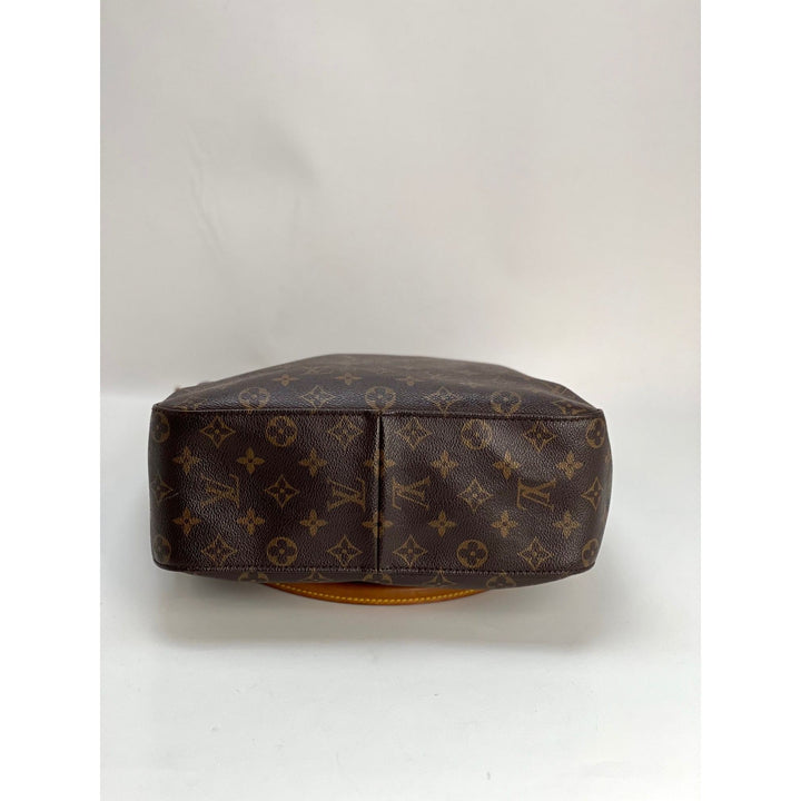 Bottom view of LOUIS VUITTON Looping GM Monogram Shoulder Bag showcasing luxury bags design and signature monogram.