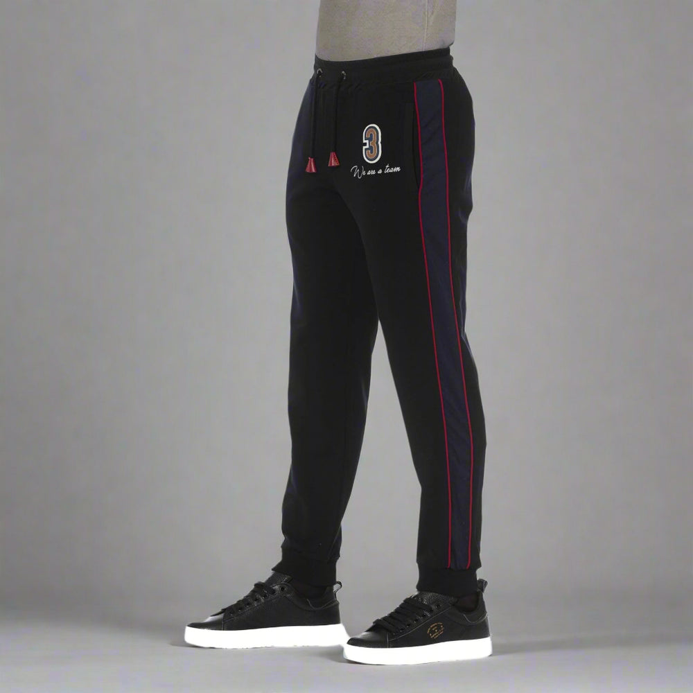 Black joggers with red side stripes