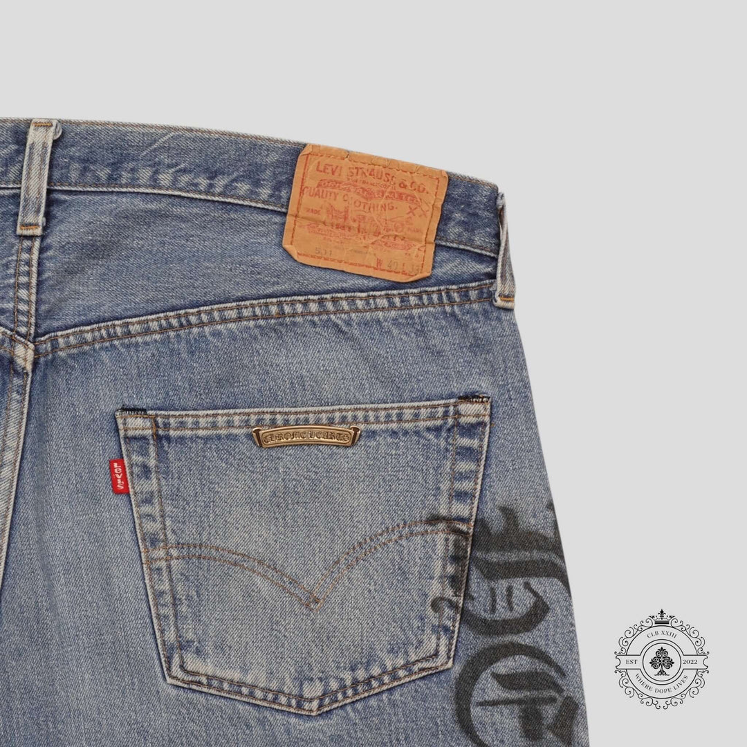 Chrome Hearts Stencil Cross Patch Jeans featuring unique back pocket design with iconic Levi's branding.