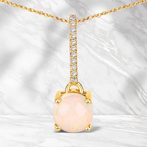 0.53 Carat Genuine Ethiopian Opal and White Diamond 10K Yellow Gold Pendant