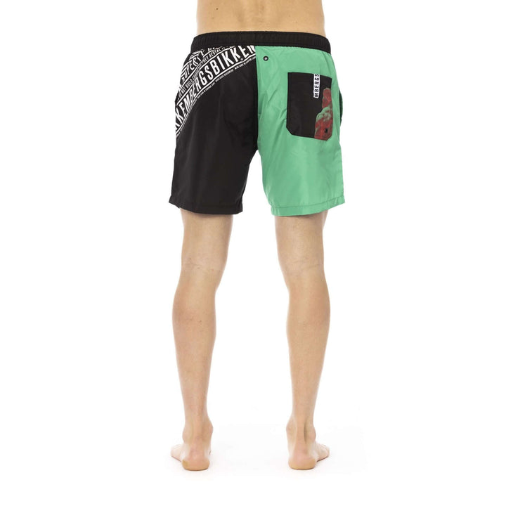 Men’s Bikkembergs beachwear and swimwear collection at STORE 7994 featuring modern swim trunks and sporty beach styles for summer.
