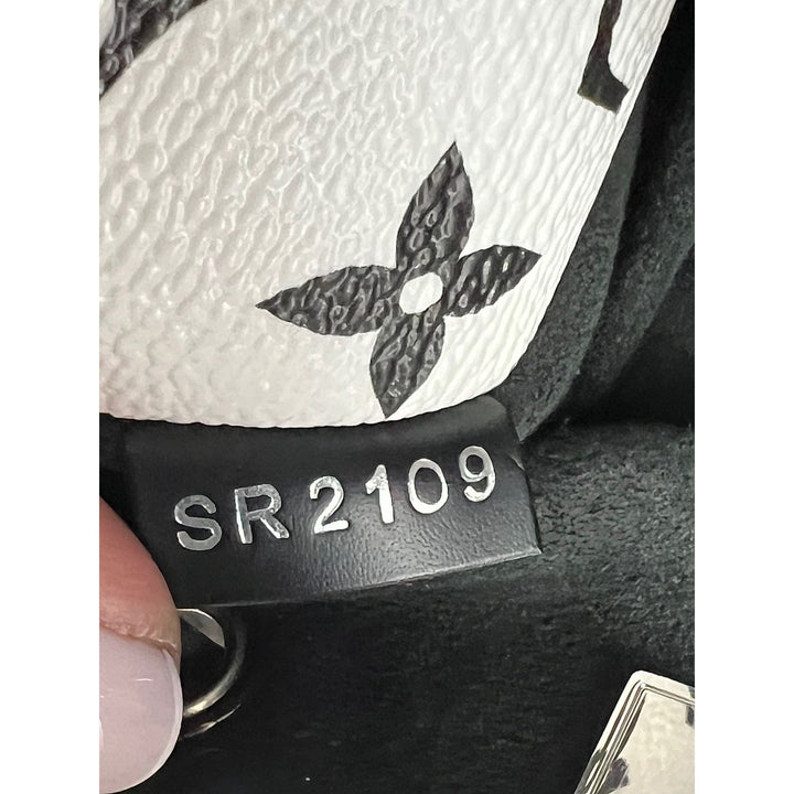 LOUIS VUITTON Hot Springs Backpack White Monogram and Patent Leather date code SR2109 on interior lining.