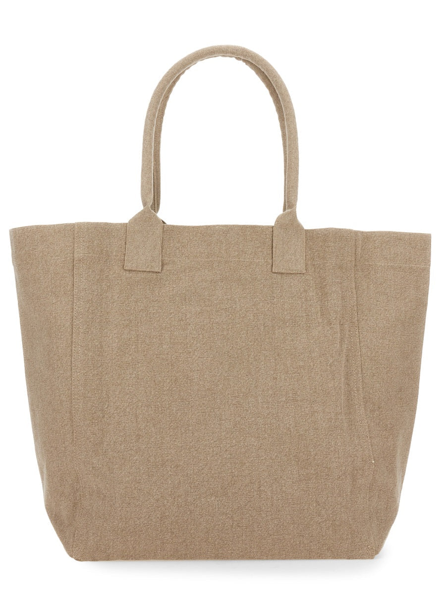 Beige tote bag on a white background
