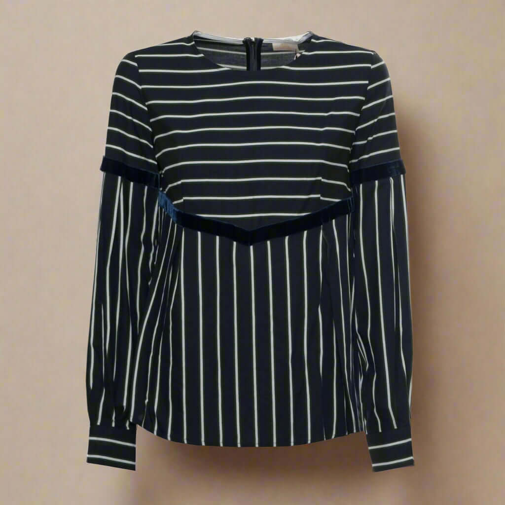 Black and white striped long-sleeve top on a white background