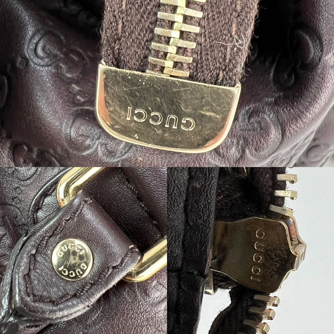 Close-up of Gucci leather strap with gold buckle on a dark background