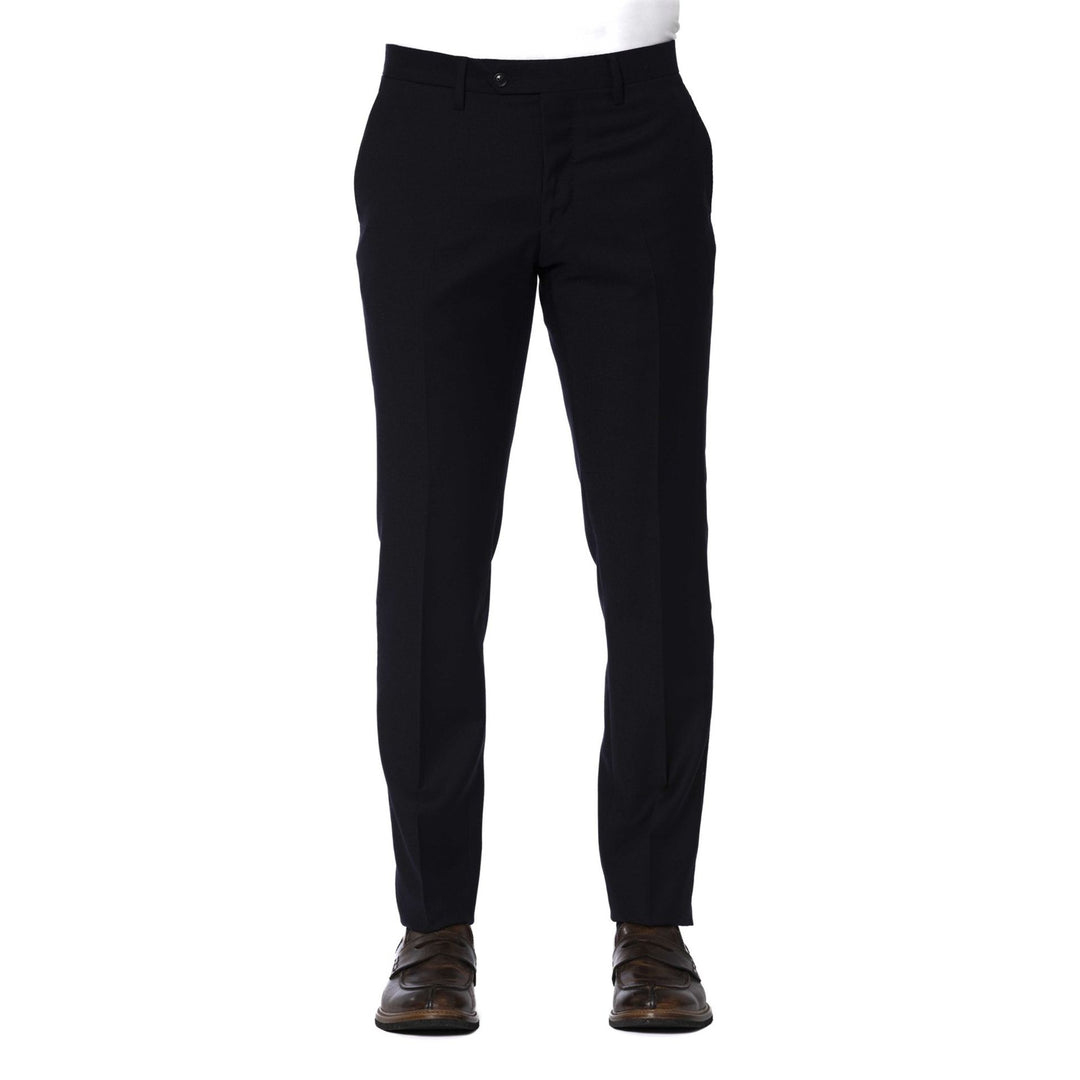 A pair of Trussardi brand trousers displayed on a model, featuring a solid navy color, multiple pockets, and a secure button and zip fastening.