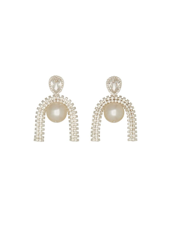 Pair of earrings with pearl-like beads and crystal-like elements on a white background