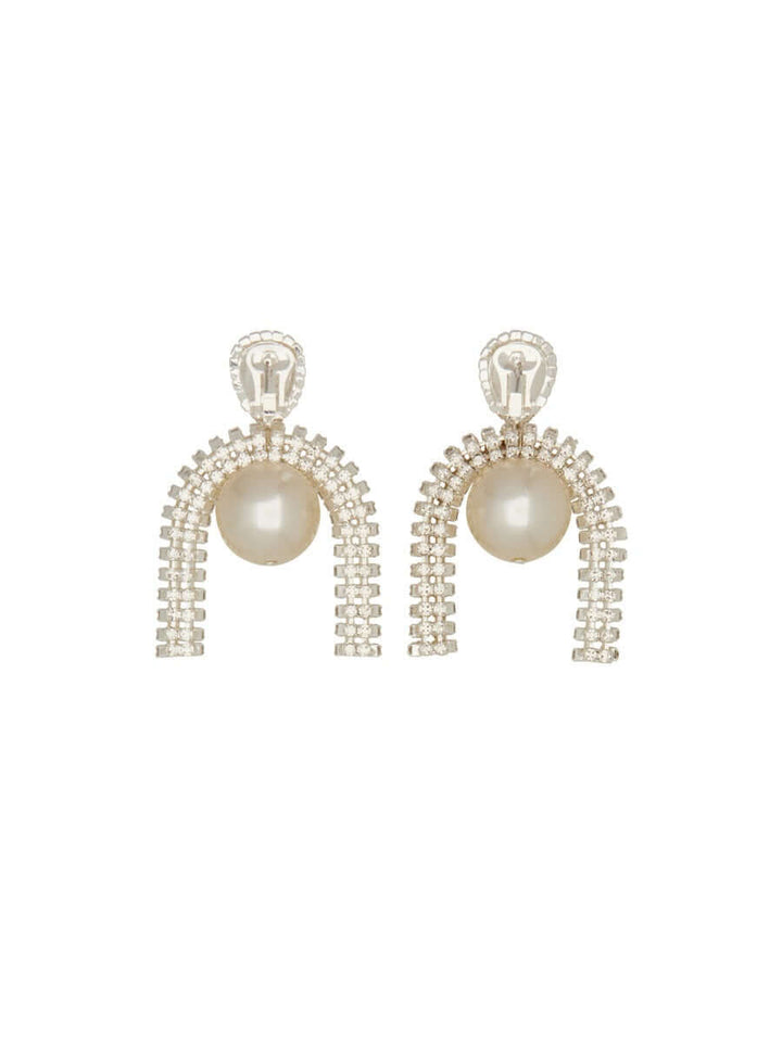 Pair of pearl earrings on a white background