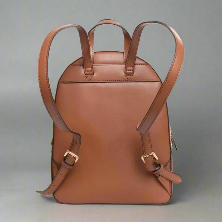 Brown leather backpack on a white background