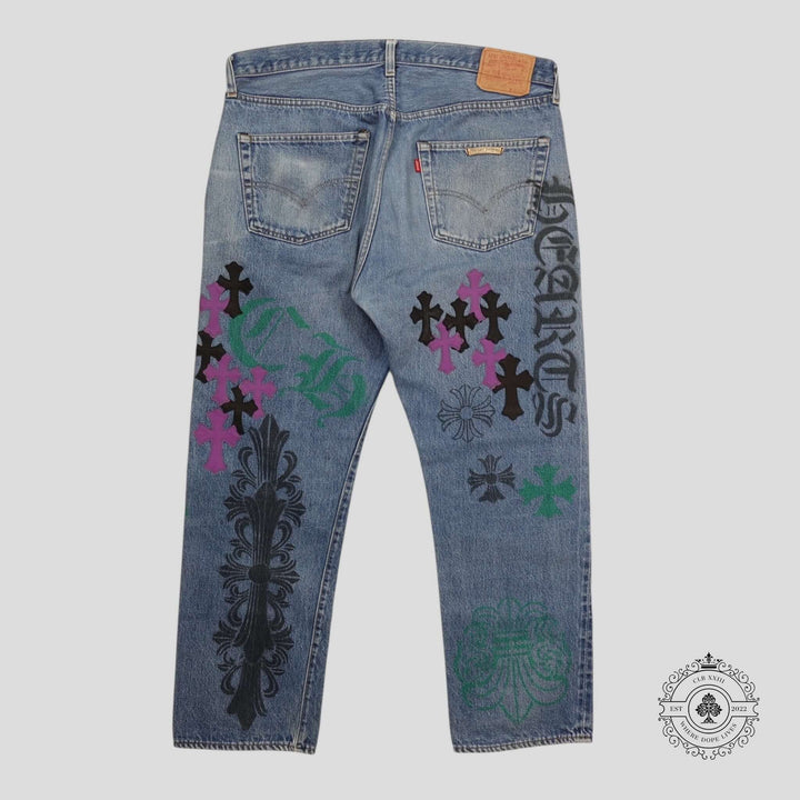 Chrome Hearts Stencil Cross Patch Jeans with unique colorful cross patches on a luxury denim background.