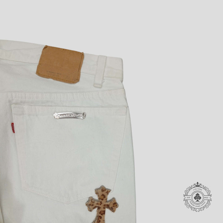 Chrome Hearts Levis Cross Patch Jeans in White / Leopard showing back pocket and sterling silver hardware details.