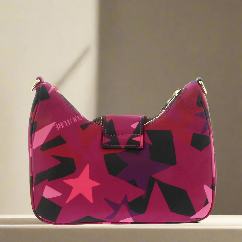 Versace Jeans Couture shoulder bag in vibrant pink with star pattern and zip closure, perfect for women.