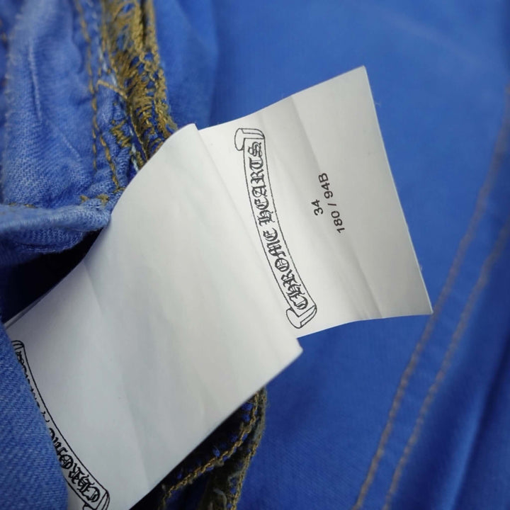 Chrome Hearts Levis Cross Patch Jeans in Blue tag showcasing authenticity and rarity of Chrome Hearts luxury denim jeans.