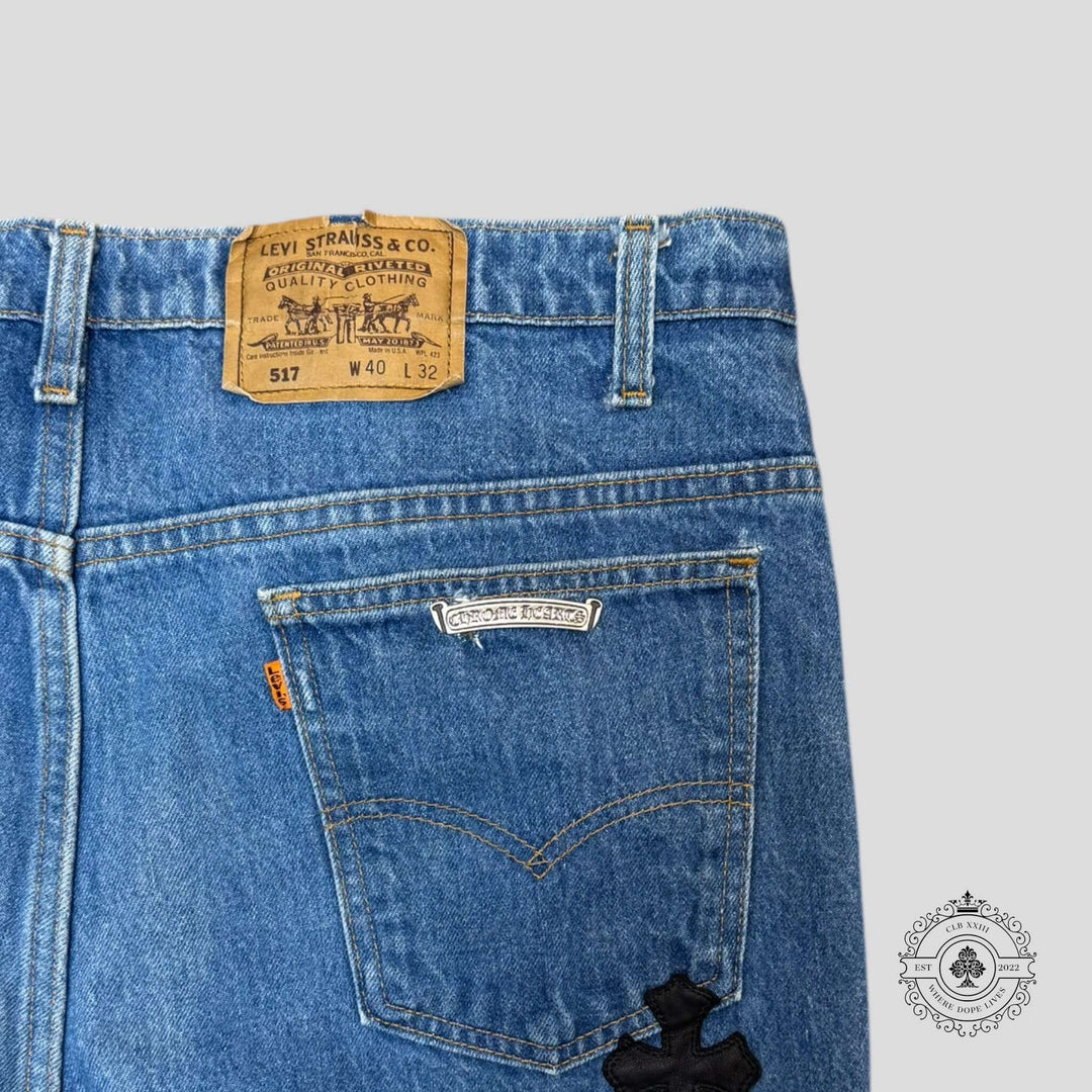 Chrome Hearts Cross Patch Levis in excellent condition with dark indigo color and rare .925 sterling silver hardware.