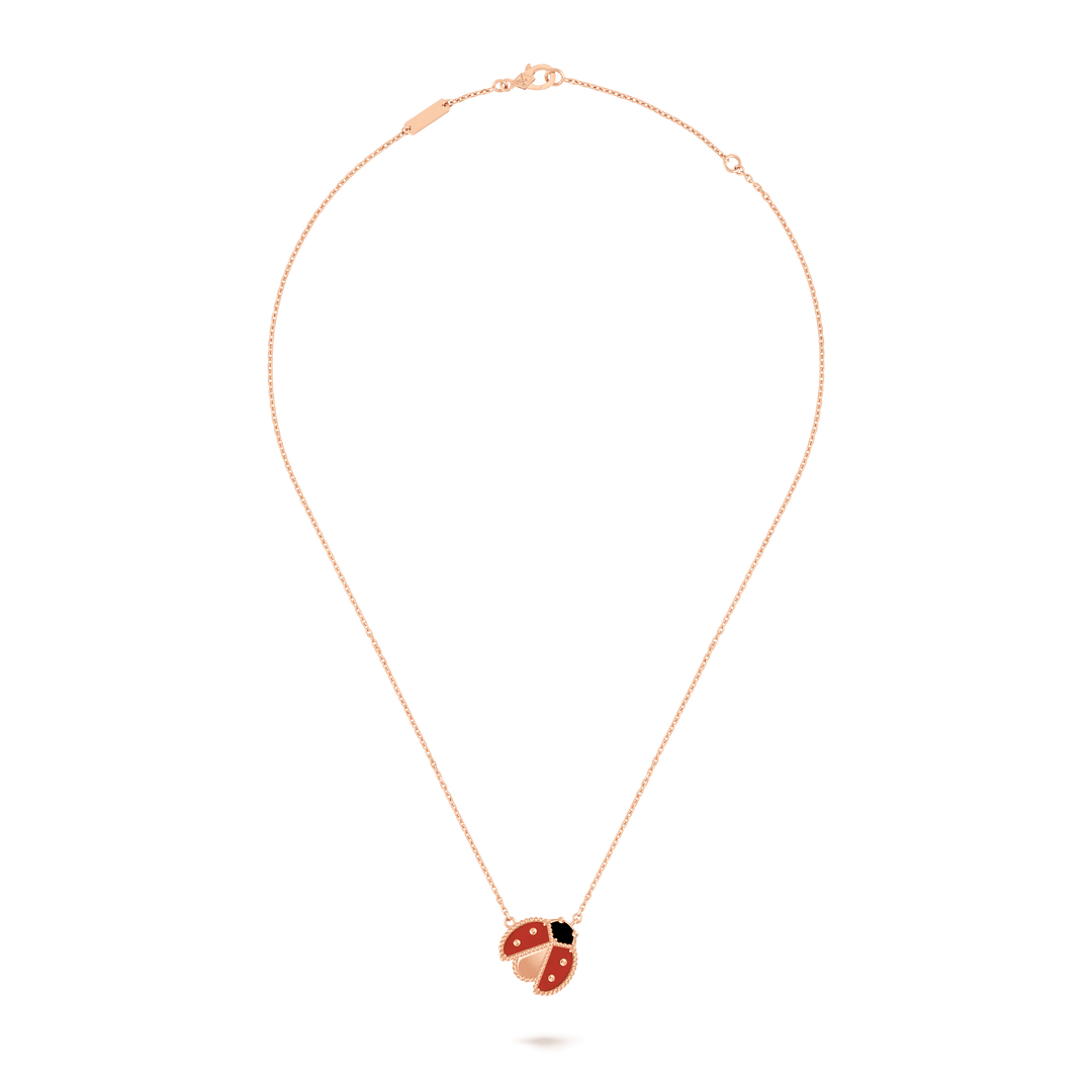 Van Cleef & Arpels Lucky Spring pendant, open wings ladybug 18K rose gold, Carnelian, Onyx on a delicate chain.