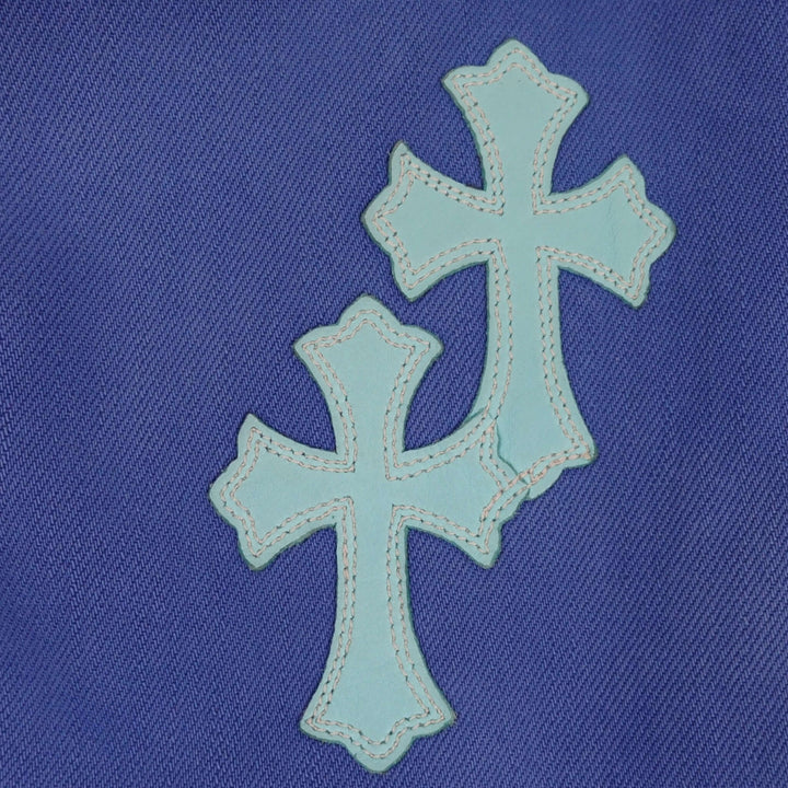Chrome Hearts Levis Cross Patch Jeans in Blue with unique cross patches showcasing authentic luxury denim design.