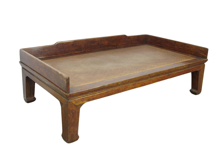 Wooden tray with a beige surface on a white background