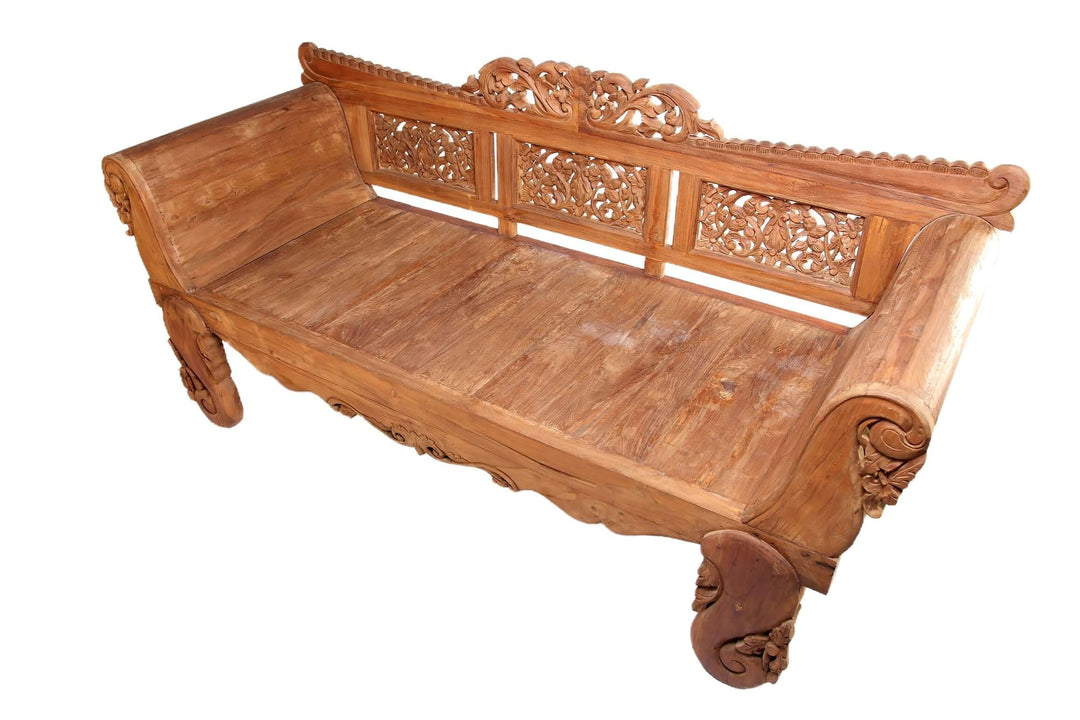 Wooden carved bench on a white background