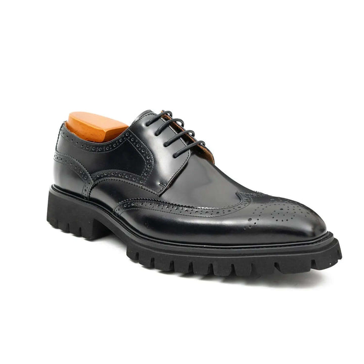 Black Derby brogue shoes by DV DIVINCH, handcrafted calfskin leather, detailed design, cushioned rubber sole.