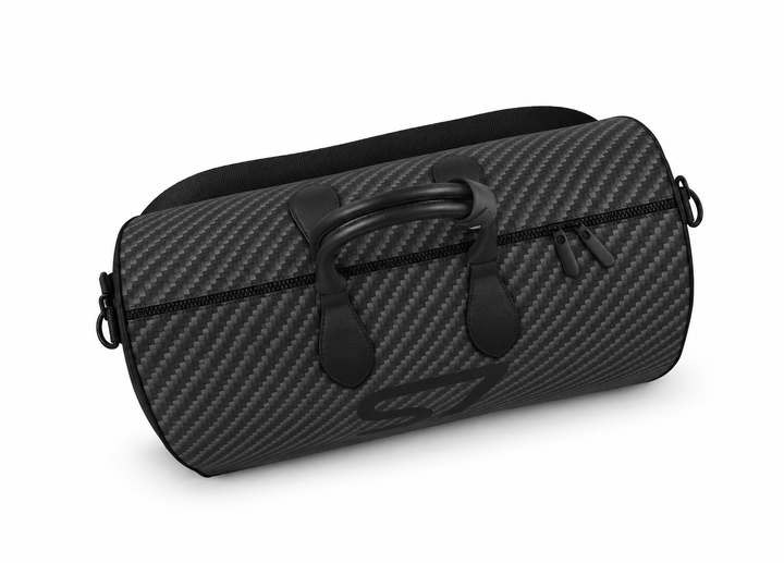 S7 Carbon Noir leather duffle bag with a graphite carbon-fiber-inspired print, centered black S7 monogram, black handles and solid black end panels.