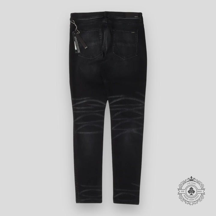 Amiri Leopard Patch Thrasher Jeans in Black