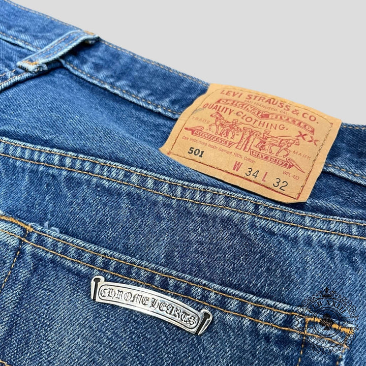 Chrome Hearts Levi Patch Jeans in Black/Blue/White showcasing authentic luxury denim with rare detailing.