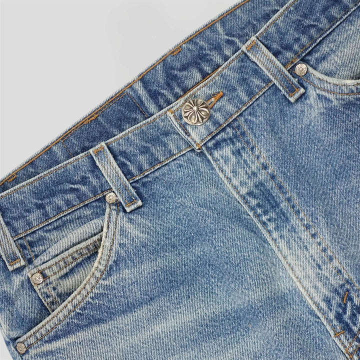 Chrome Hearts Cross Patch Jeans showcasing luxury denim details and fantastic condition.