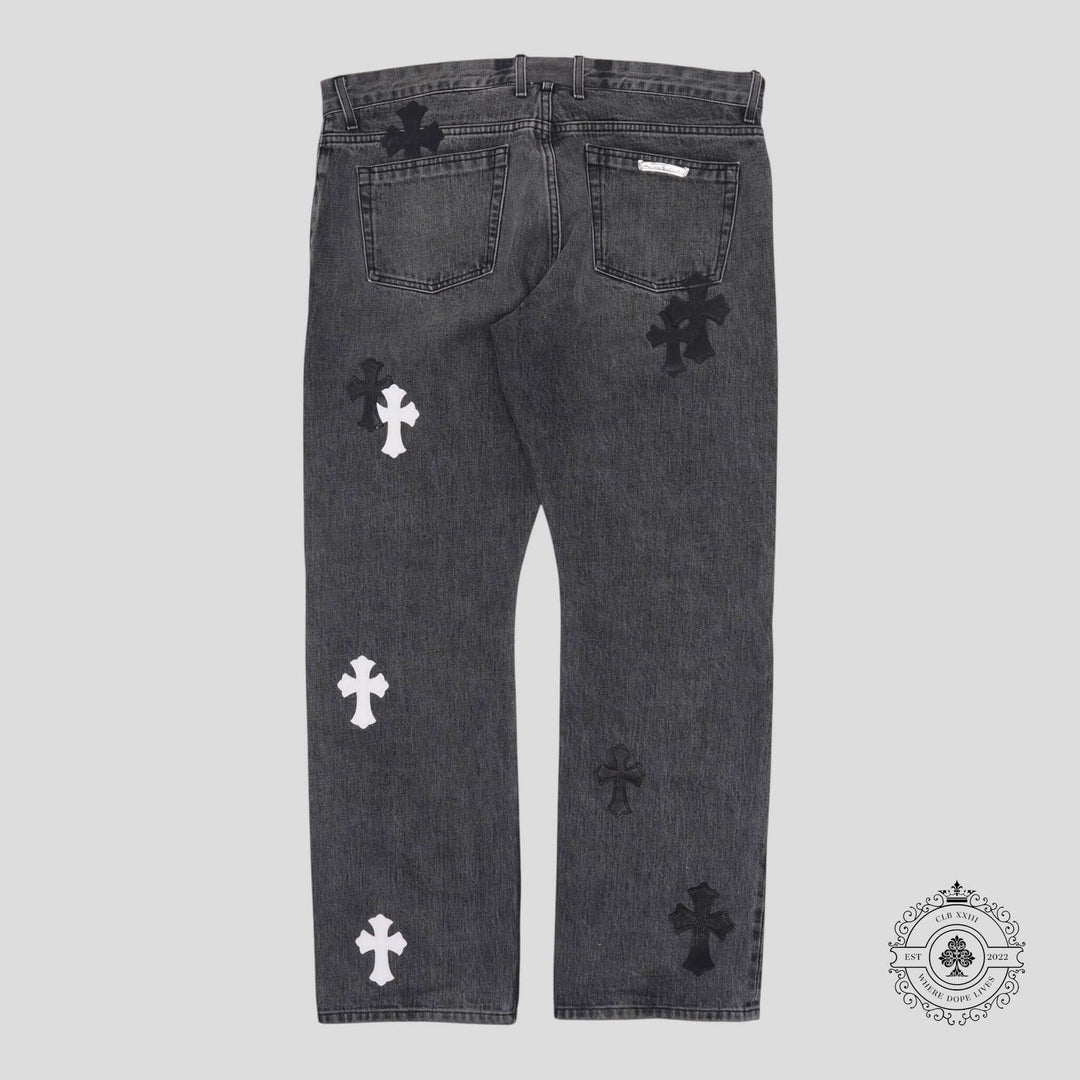 Chrome Hearts Fleur Knee Cross Patch Jeans in Black / White featuring rare crosses, luxury denim craftsmanship.