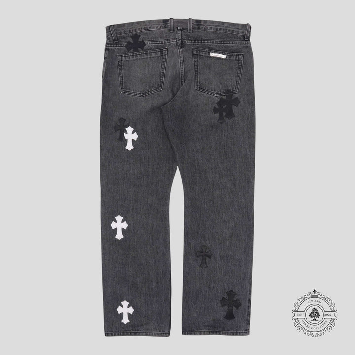 Chrome Hearts Fleur Knee Cross Patch Jeans in Black / White featuring rare crosses, luxury denim craftsmanship.