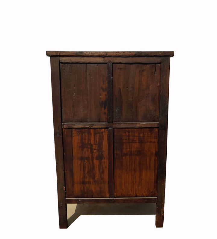 Wooden cabinet with four doors on a white background
