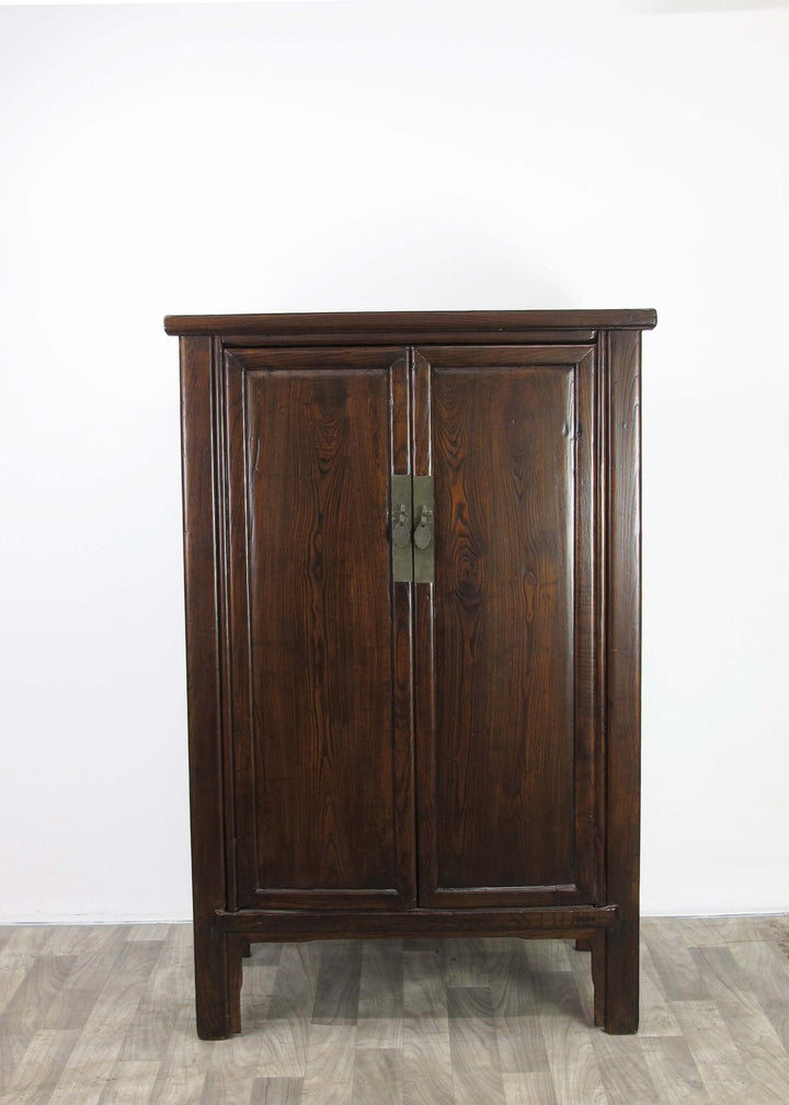 Wooden cabinet with two doors on a white background