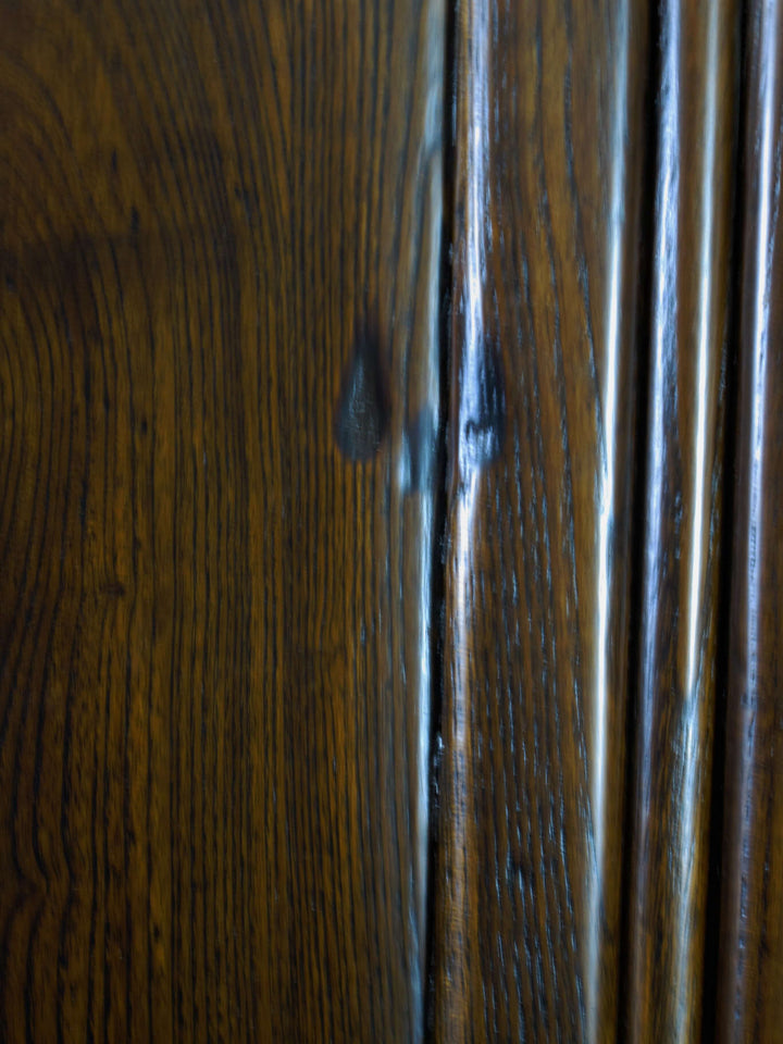 Close-up of a wooden surface with visible grain and texture