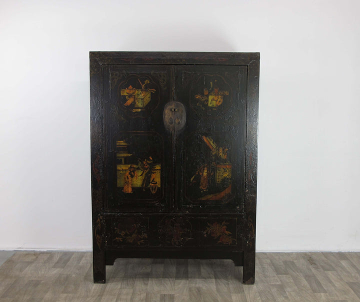 Vintage wooden cabinet with decorative paint on a plain white background