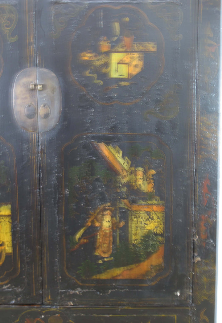 Decorative wooden panel with intricate paintings and a metallic lock.