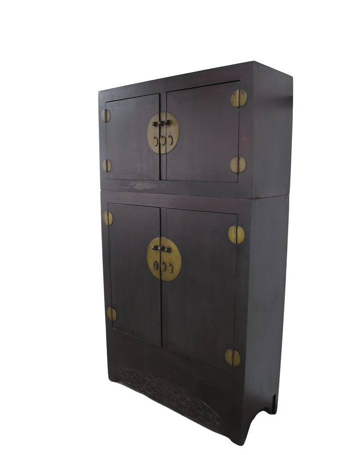 Dark wooden cabinet with gold circular designs on a white background